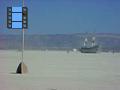 Ship crosses the daytime desert